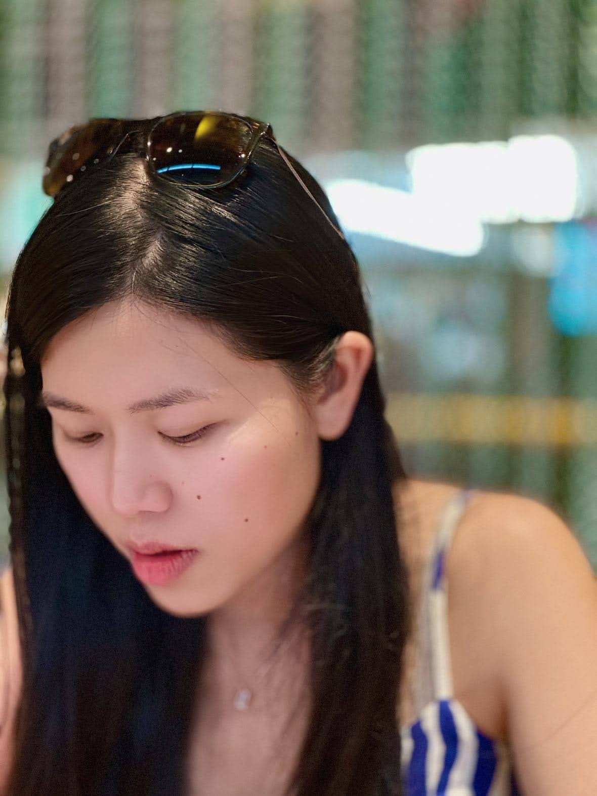 Person carrying flowers